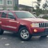 Horizontal photograph of a 2006JeepGrand CherokeeLimited Sport Utility 4D