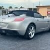 Horizontal photograph of a 2008SaturnSKYRoadster 2D