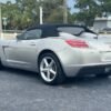 Horizontal photograph of a 2008SaturnSKYRoadster 2D