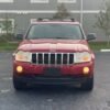 Horizontal photograph of a 2006JeepGrand CherokeeLimited Sport Utility 4D