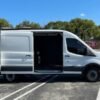 Horizontal photograph of a 2019FordTransit 150 VanMedium Roof w/Sliding Side Door w/LWB Van 3D