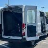 Horizontal photograph of a 2019FordTransit 150 VanMedium Roof w/Sliding Side Door w/LWB Van 3D