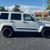 Horizontal photograph of a 2012JeepLibertySport SUV 4D