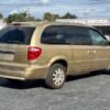 Horizontal photograph of a 2005ChryslerTown & CountryTouring Minivan 4D