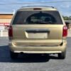 Horizontal photograph of a 2005ChryslerTown & CountryTouring Minivan 4D