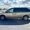 Horizontal photograph of a 2005ChryslerTown & CountryTouring Minivan 4D