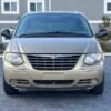 Horizontal photograph of a 2005ChryslerTown & CountryTouring Minivan 4D