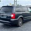 Horizontal photograph of a 2014ChryslerTown & CountryS Minivan 4D