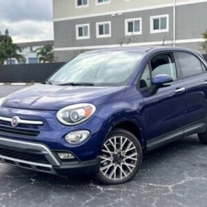 Horizontal photograph of a 2016FIAT500XTrekking Sport Utility 4D