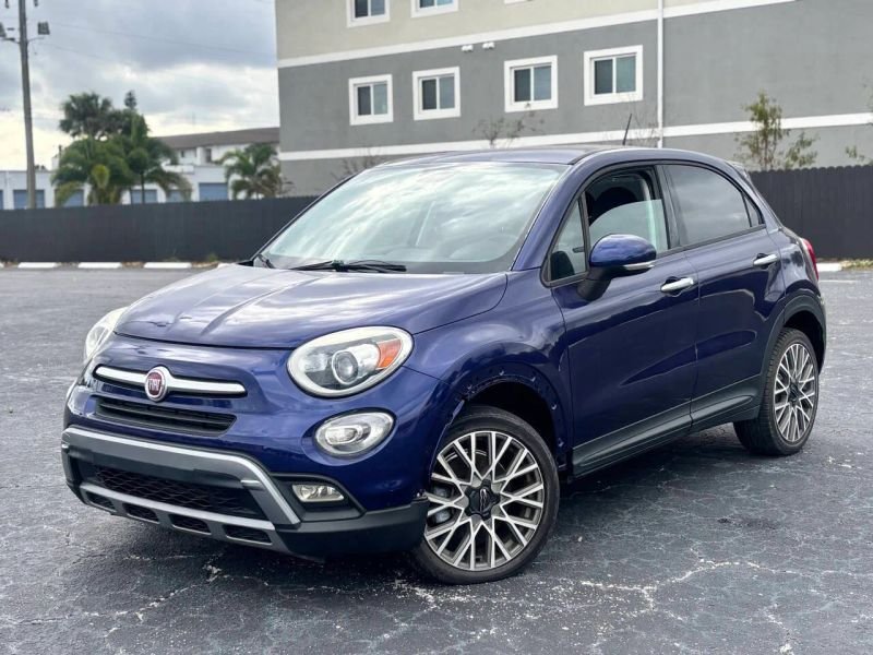 Horizontal photograph of a 2016FIAT500XTrekking Sport Utility 4D