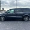 Horizontal photograph of a 2014ChryslerTown & CountryS Minivan 4D