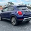Horizontal photograph of a 2016FIAT500XTrekking Sport Utility 4D