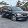 Horizontal photograph of a 2014ChryslerTown & CountryS Minivan 4D