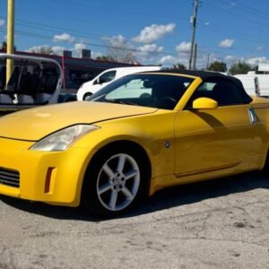 Horizontal photograph of a 2005Nissan350ZTouring Roadster 2D