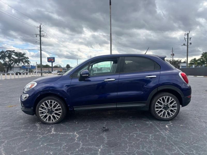 Horizontal photograph of a 2016FIAT500XTrekking Sport Utility 4D