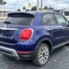 Horizontal photograph of a 2016FIAT500XTrekking Sport Utility 4D