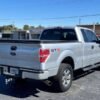 Horizontal photograph of a 2013FordF150 Super CabSTX Pickup 4D 6 1/2 ft