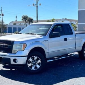 Horizontal photograph of a 2013FordF150 Super CabSTX Pickup 4D 6 1/2 ft