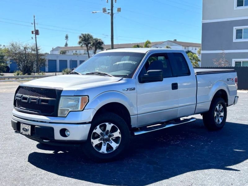 Horizontal photograph of a 2013FordF150 Super CabSTX Pickup 4D 6 1/2 ft