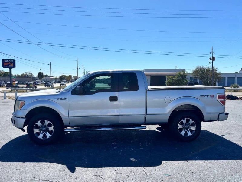 Horizontal photograph of a 2013FordF150 Super CabSTX Pickup 4D 6 1/2 ft