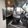 Horizontal photograph of a 2015FordTransit 150 VanMedium Roof w/Sliding Side Door w/LWB Van 3D