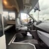 Horizontal photograph of a 2015FordTransit 150 VanMedium Roof w/Sliding Side Door w/LWB Van 3D