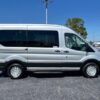 Horizontal photograph of a 2018FordTransit 150 WagonXLT w/Medium Roof w/Sliding Side Door Van 3D