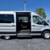 Horizontal photograph of a 2018FordTransit 150 WagonXLT w/Medium Roof w/Sliding Side Door Van 3D