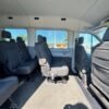 Horizontal photograph of a 2018FordTransit 150 WagonXLT w/Medium Roof w/Sliding Side Door Van 3D