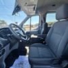 Horizontal photograph of a 2018FordTransit 150 WagonXLT w/Medium Roof w/Sliding Side Door Van 3D
