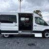 Horizontal photograph of a 2015FordTransit 150 VanMedium Roof w/Sliding Side Door w/LWB Van 3D