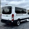 Horizontal photograph of a 2015FordTransit 150 VanMedium Roof w/Sliding Side Door w/LWB Van 3D