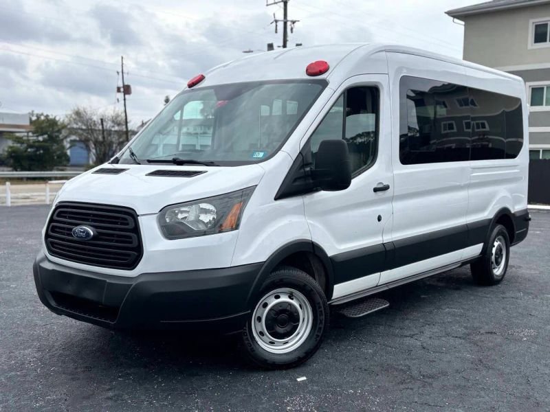 Horizontal photograph of a 2015FordTransit 150 VanMedium Roof w/Sliding Side Door w/LWB Van 3D