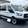 Horizontal photograph of a 2015FordTransit 150 VanMedium Roof w/Sliding Side Door w/LWB Van 3D