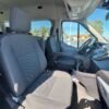 Horizontal photograph of a 2018FordTransit 150 WagonXLT w/Medium Roof w/Sliding Side Door Van 3D