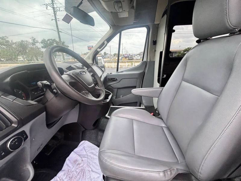 Horizontal photograph of a 2015FordTransit 150 VanMedium Roof w/Sliding Side Door w/LWB Van 3D