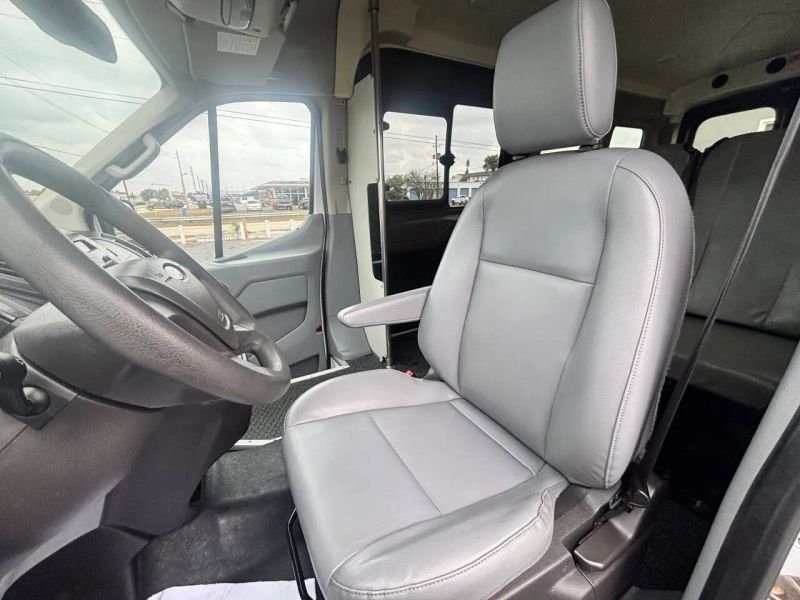 Horizontal photograph of a 2015FordTransit 150 VanMedium Roof w/Sliding Side Door w/LWB Van 3D