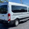 Horizontal photograph of a 2016FordTransit 350 WagonXLT w/Medium Roof w/Sliding Side Door Van 3D