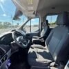 Horizontal photograph of a 2016FordTransit 350 WagonXLT w/Medium Roof w/Sliding Side Door Van 3D