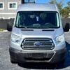 Horizontal photograph of a 2016FordTransit 350 WagonXLT w/Medium Roof w/Sliding Side Door Van 3D