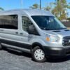 Horizontal photograph of a 2016FordTransit 350 WagonXLT w/Medium Roof w/Sliding Side Door Van 3D