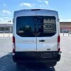 Horizontal photograph of a 2016FordTransit 350 WagonXLT w/Medium Roof w/Sliding Side Door Van 3D