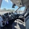 Horizontal photograph of a 2016FordTransit 350 WagonXLT w/Medium Roof w/Sliding Side Door Van 3D