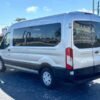 Horizontal photograph of a 2016FordTransit 350 WagonXLT w/Medium Roof w/Sliding Side Door Van 3D