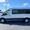 Horizontal photograph of a 2016FordTransit 350 WagonXLT w/Medium Roof w/Sliding Side Door Van 3D