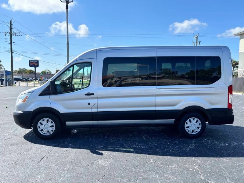 Horizontal photograph of a 2016FordTransit 350 WagonXLT w/Medium Roof w/Sliding Side Door Van 3D