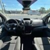 Horizontal photograph of a 2016FordTransit 350 WagonXLT w/Medium Roof w/Sliding Side Door Van 3D