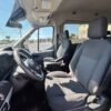 Horizontal photograph of a 2016FordTransit 350 WagonXLT w/Medium Roof w/Sliding Side Door Van 3D