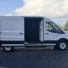 Horizontal photograph of a 2019FordTransit 150 VanMedium Roof w/Sliding Side Door w/LWB Van 3D
