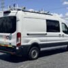 Horizontal photograph of a 2020FordTransit 250 Cargo VanMedium Roof w/LWB Van 3D